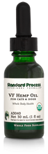 Load image into Gallery viewer, Image of a bottle of liquid VF Hemp Oil from Standard Process Veterinary Formulas next to a dropper that is included with the bottle.