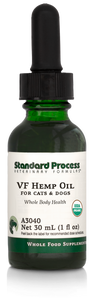 Image of a bottle of liquid VF Hemp Oil from Standard Process Veterinary Formulas next to a dropper that is included with the bottle.