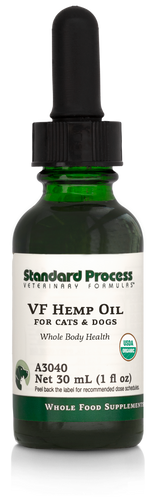 Image of a bottle of liquid VF Hemp Oil from Standard Process Veterinary Formulas next to a dropper that is included with the bottle.